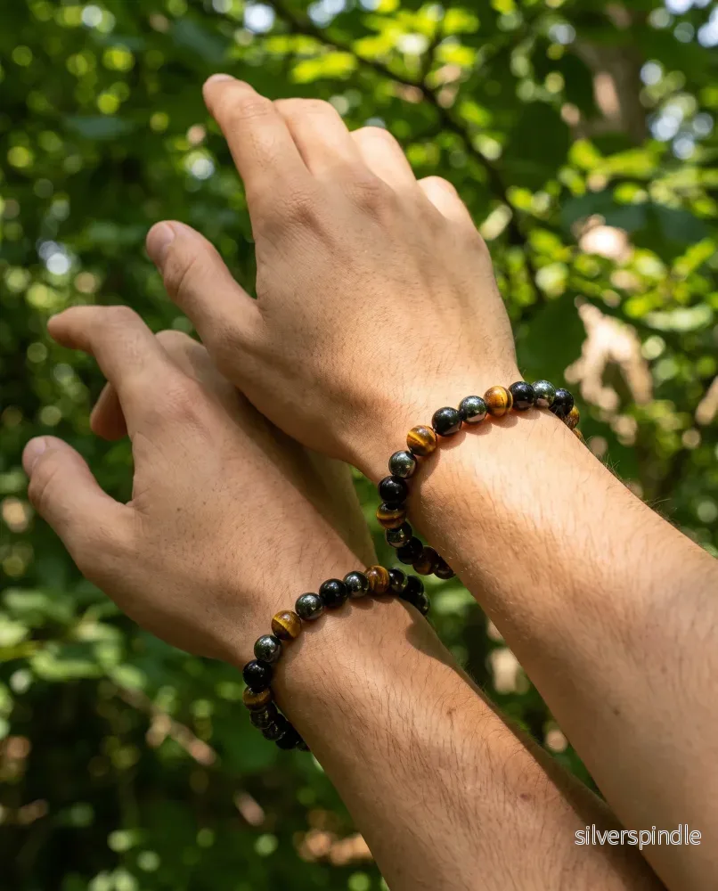 Armband av Hematit, Obsidian och Tigeröga Armband av Hematit, Obsidian och Tigeröga