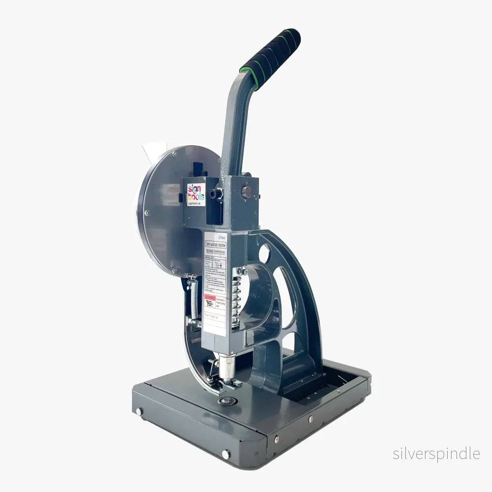 Semi-automatisk öljetteringsmaskin