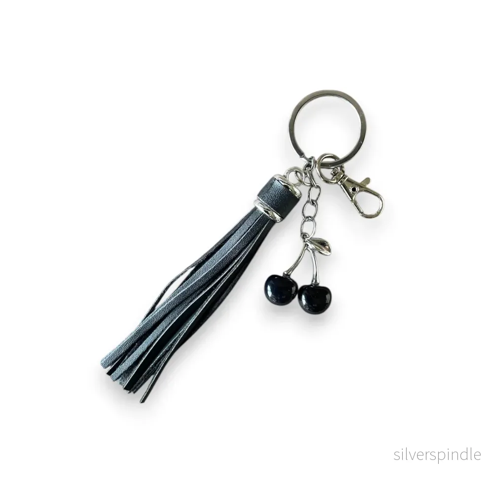 BAG CHARM TASSEL CHERRY